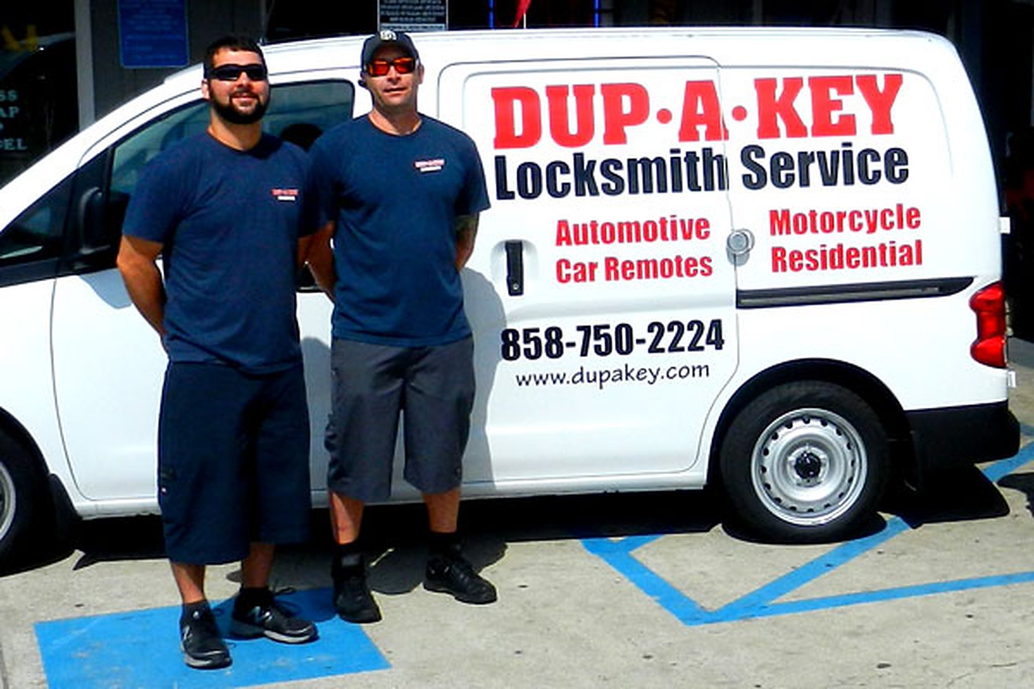 Vincent and Weston Fisk in front of a DUP-A-KEY van